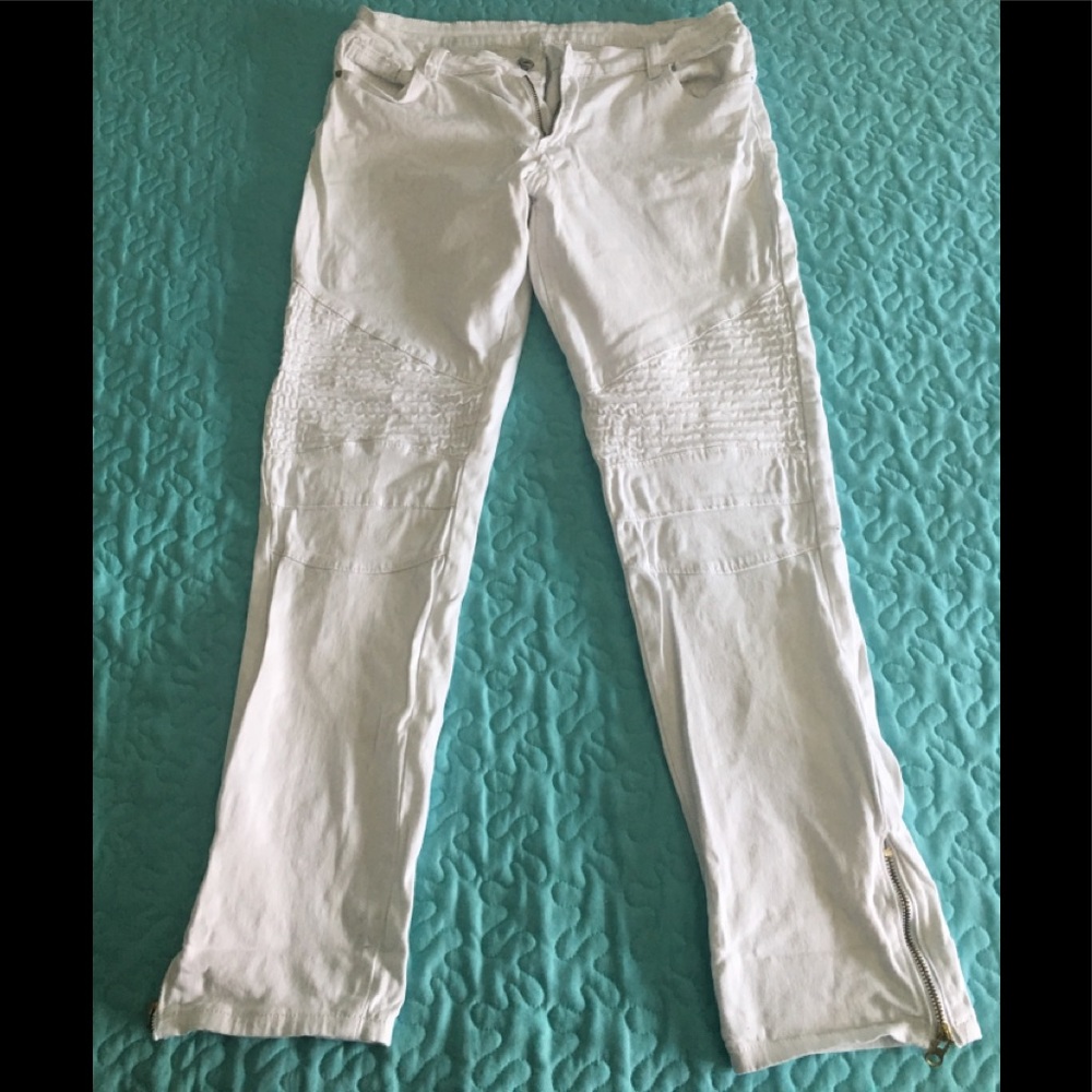 White jeans, with gold zipper at the bottom